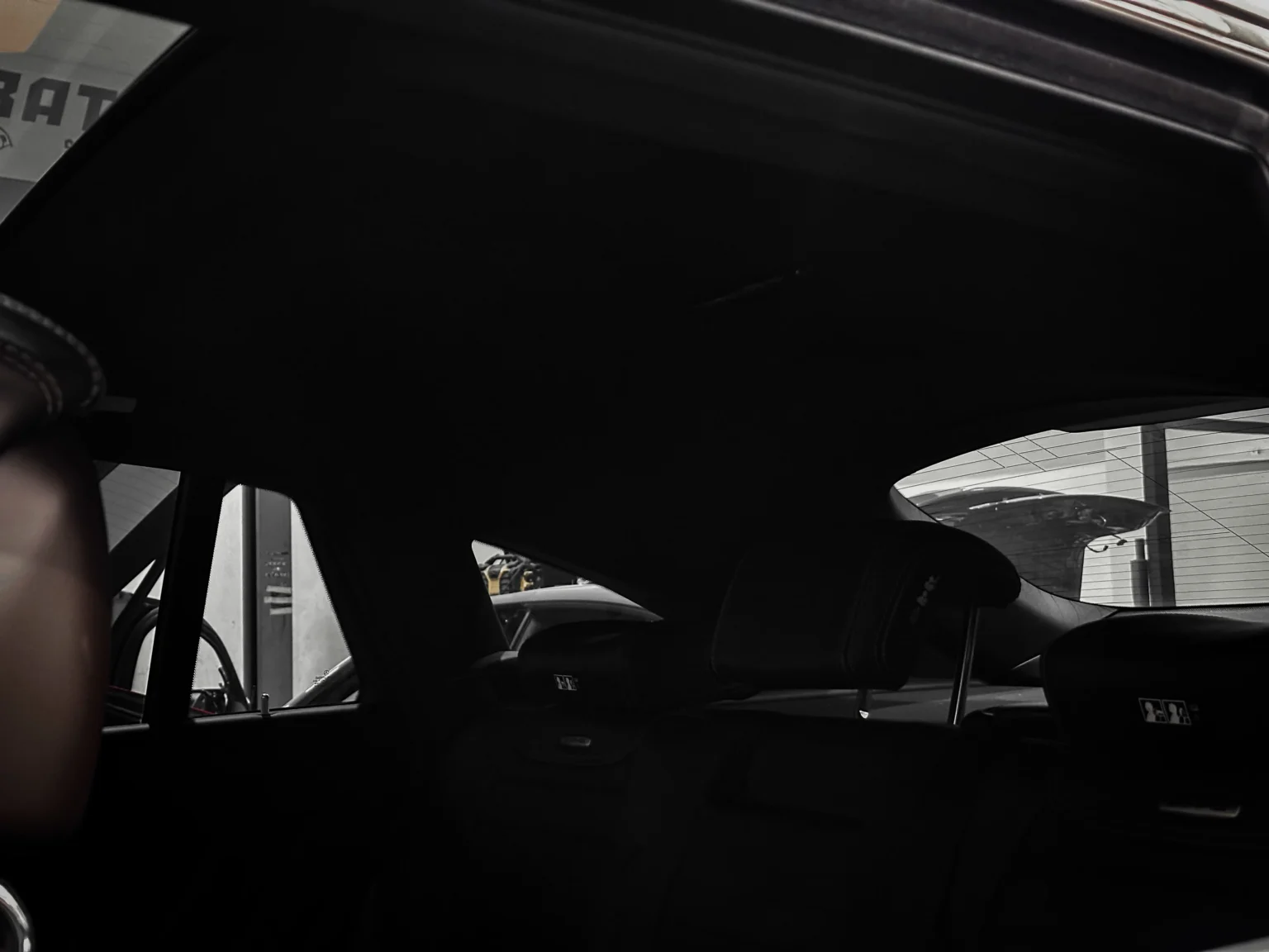 Car interior with starry sky headliner