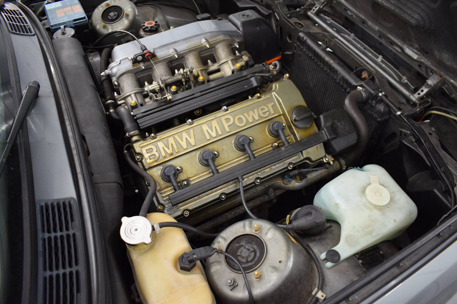 Engine bay before intensive treatment